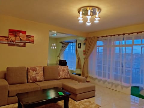 Apartment, 3 Bedrooms | Living area | Flat-screen TV