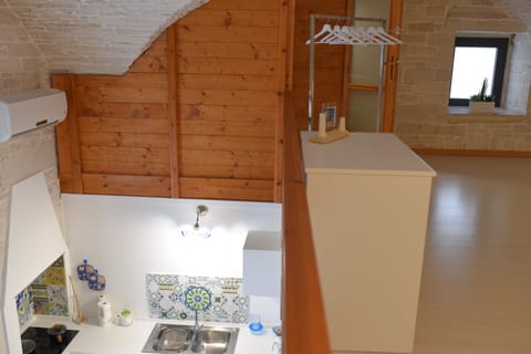 Apartment, 1 Bedroom | Private kitchenette | Fridge, stovetop, coffee/tea maker, electric kettle