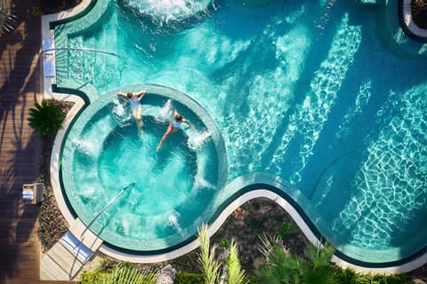 5 outdoor pools, open 7:00 AM to 7:00 PM, cabanas (surcharge)