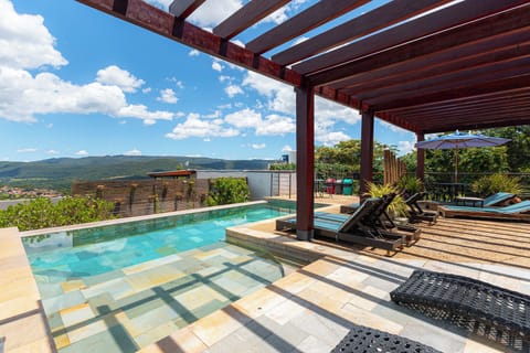 Outdoor pool, open 9:00 AM to 10:00 PM, pool umbrellas, sun loungers