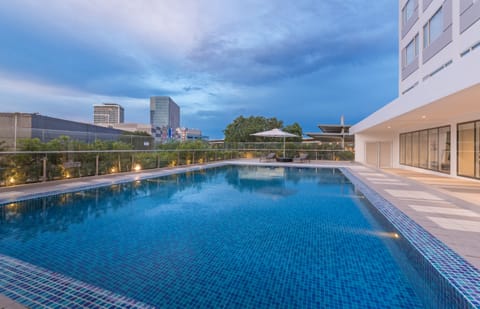 Outdoor pool, open 7:00 AM to 8:00 PM, pool umbrellas, sun loungers