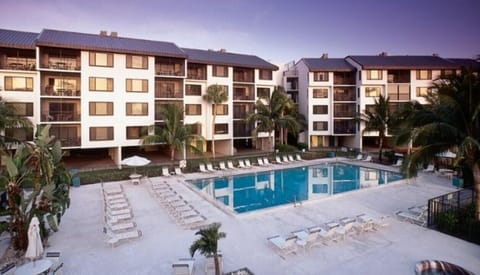 Pool and hot tub area with bathrooms
