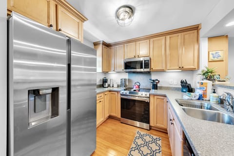 Bright and open kitchen fully stocked and ready for gourmet meals.