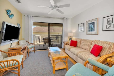 Shipwatch 307 - Living room area with access to balcony