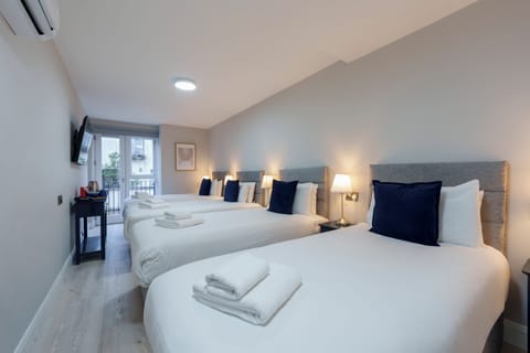 Quadruple Room, 4 Twin Beds | Free WiFi, bed sheets
