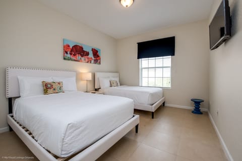 Spacious Bedroom with 2 double bed with Smart TV for entertainment