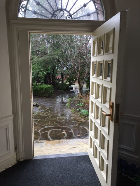 Front door! Leads to the rose garden with water feature .