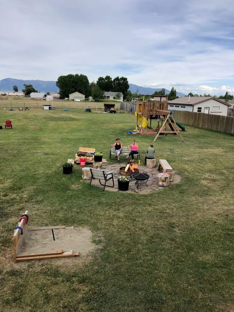 Lots of room to entertain. How about a game of horse shoes ?