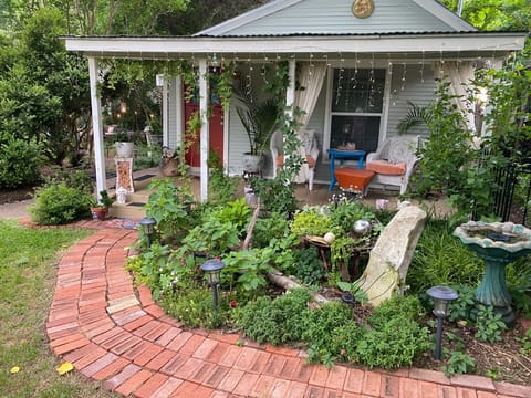 Path from carport to front door of cottage