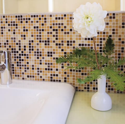 Combined shower/tub, eco-friendly toiletries, hair dryer, towels