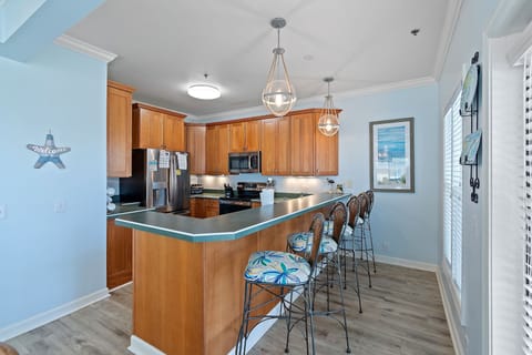 Our bar seating accommodates up to 5 seated guests