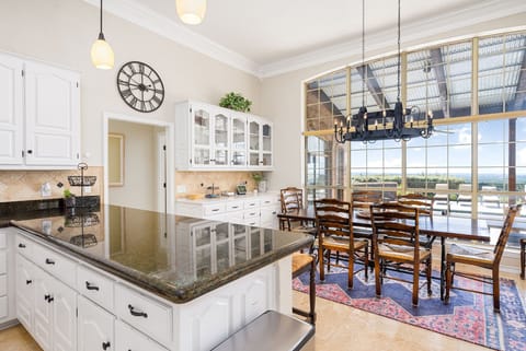 Gather around the table and enjoy your meal and the views.