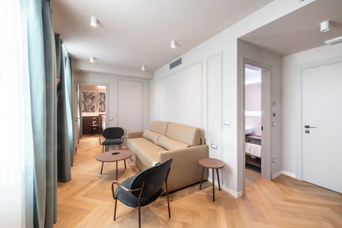 Suite | Living area | 32-inch LCD TV with digital channels, TV, pay movies