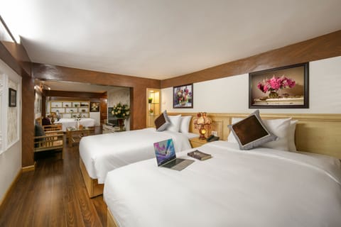 Family Studio Suite, 2 Bedrooms, Non Smoking, City View | Down comforters, minibar, in-room safe, desk