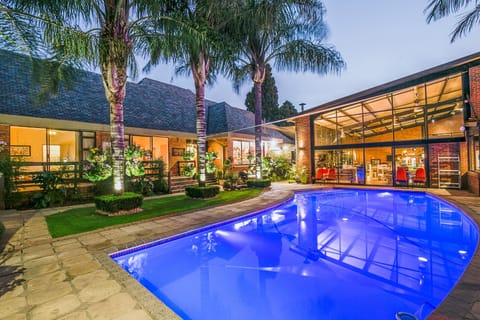 Outdoor pool, pool umbrellas, sun loungers