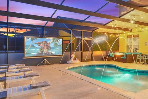 NEW!! Patio Extension complete in 2023! Plus JAW DROPPING, Fancy, Fun, Laminar Fountain Jets with LED lighting to give you the ULTIMATE pool luxury experience. PLUS the pool was resurfaced with high end glass tile and mickey mosaic at the pool bottom