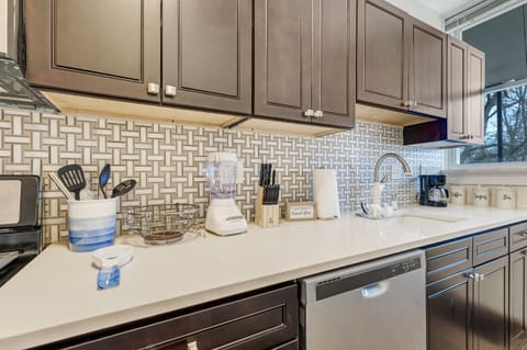 Porcelain tile surrounds this custom kitchen.
