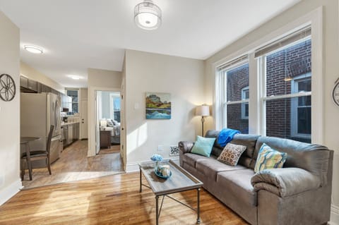 Enjoy the bright living room and plush couch.