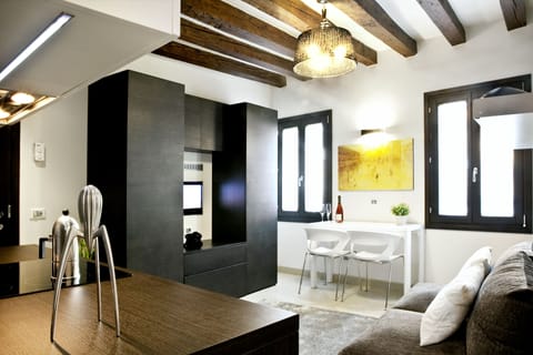 Double Room, Kitchenette | Living room | Flat-screen TV