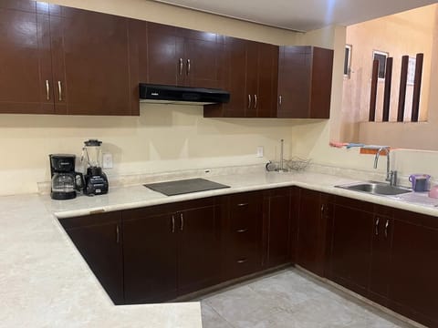 Full-size fridge, stovetop, toaster, blender