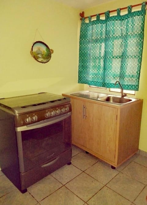 Family Apartment, Multiple Bedrooms (10 PAX) | Private kitchen | Full-size fridge, microwave, electric kettle, rice cooker