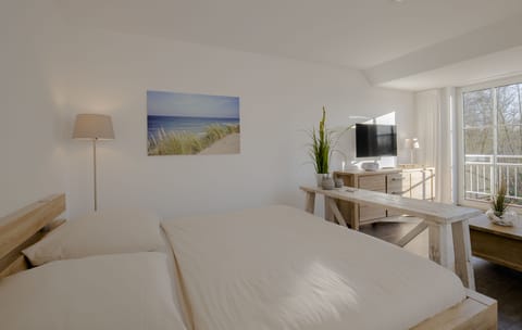 Apartment, Balcony | Down comforters, minibar, blackout drapes, soundproofing