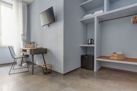 Triple Room (2) | Living area | Flat-screen TV