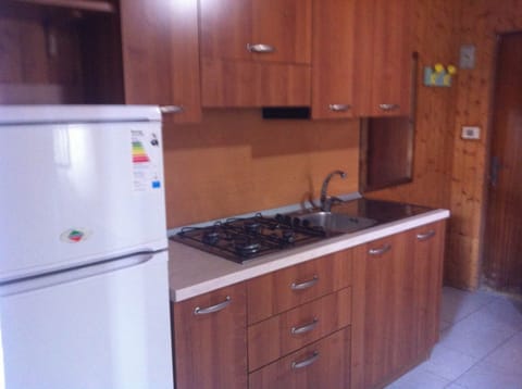 Bungalow, 2 Bedrooms | Private kitchen | Full-size fridge, oven, stovetop, cookware/dishes/utensils