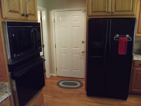 Exit to car garage from kitchen. 