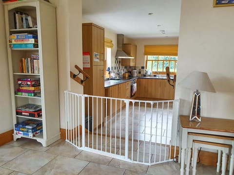 Stair gates on main staircase and at the top of the kitchen steps