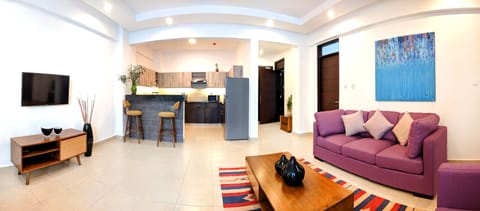 Family Duplex, Multiple Beds, City View | Living area | 52-inch Smart TV with cable channels, TV