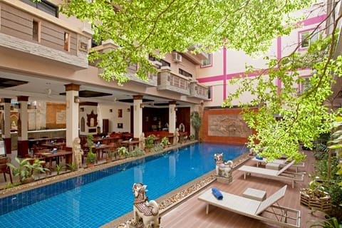 Outdoor pool, open 9:00 AM to 8:00 PM, sun loungers