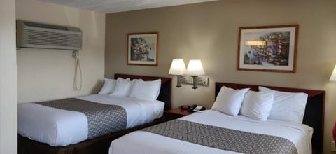 Standard Double Room, 2 Double Beds, Non Smoking | Free WiFi, bed sheets