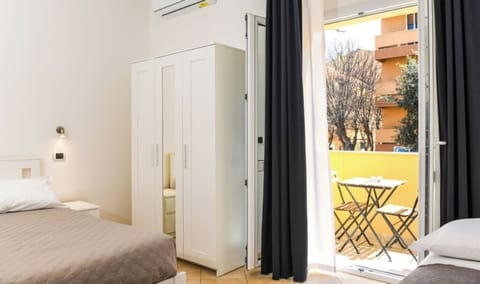 Quadruple Room, Balcony | In-room safe, blackout drapes, soundproofing, free WiFi