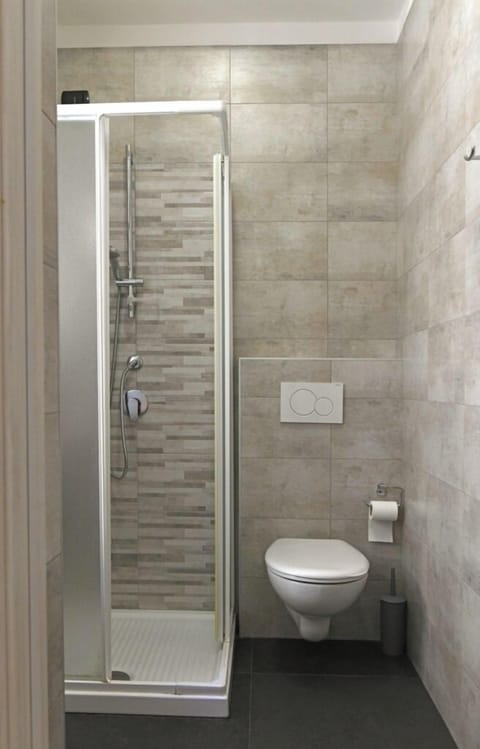 Double Room, Balcony | Bathroom | Shower, hair dryer, towels, soap