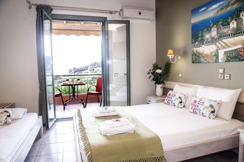 Family Studio, Sea View | In-room safe, desk, iron/ironing board, rollaway beds