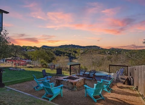 Pull up a chair as the sky goes pink over the water