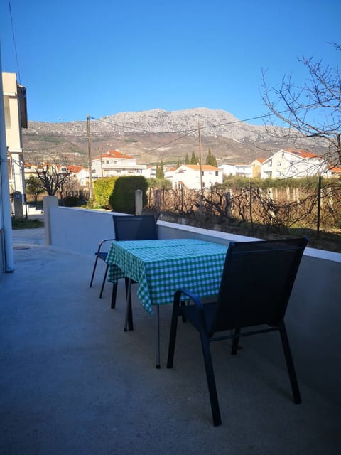 Seating place in a front of the apartment with a mountain view.