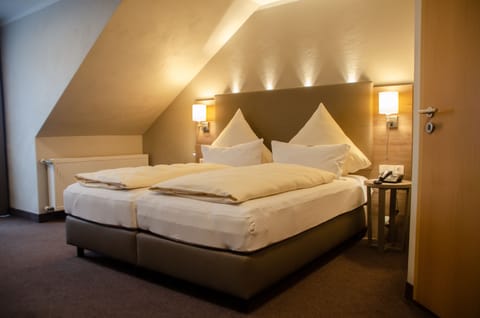 Superior Double Room, River View | Minibar, in-room safe, desk, laptop workspace