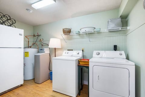 Laundry room with additional refrigerator