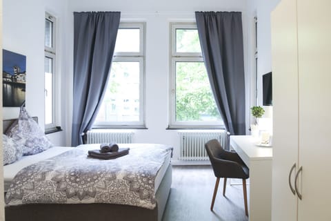 Desk, blackout drapes, free WiFi, bed sheets