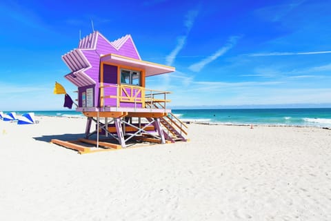 On the beach, white sand, beach towels