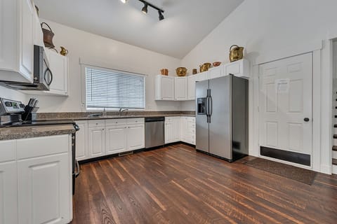 Door leads to 3-car garage