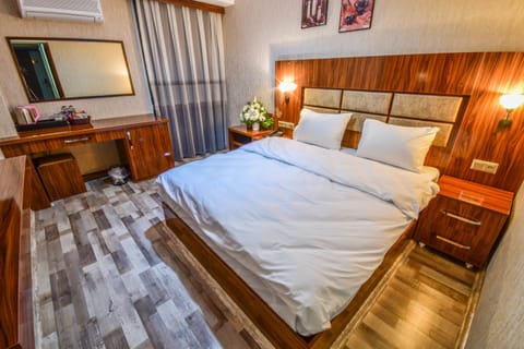 Economy Double Room | Minibar, blackout drapes, soundproofing, free WiFi