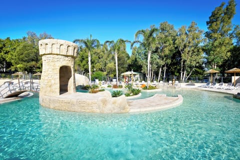 Seasonal outdoor pool, open 9:00 AM to 8:00 PM, pool umbrellas