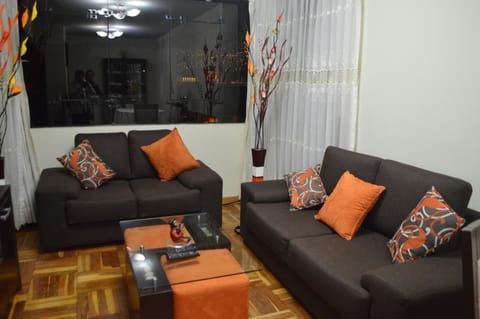 Economy Apartment, Multiple Beds | Living area | LED TV