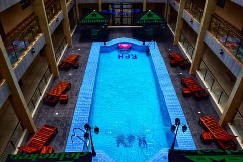 Outdoor pool, pool umbrellas, sun loungers