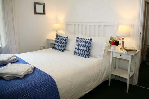 King size bed with memory foam mattress for a good night's sleep.