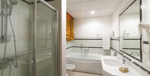 Shower, free toiletries, hair dryer, towels