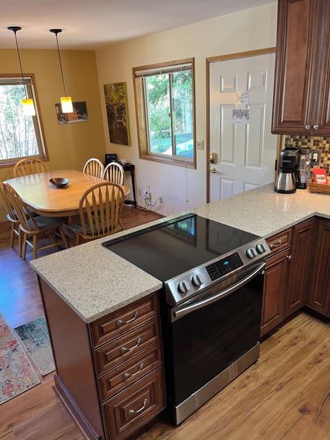 Kitchen, front door, dining room